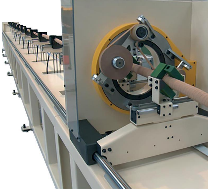 Flexible cable and conductor taping machine