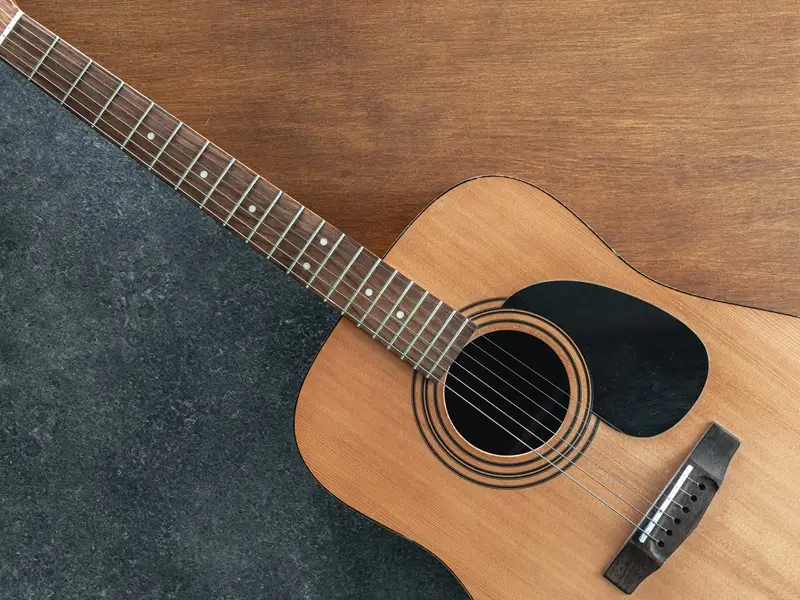 Laminated Acoustic Guitar Or All Solid Guitar