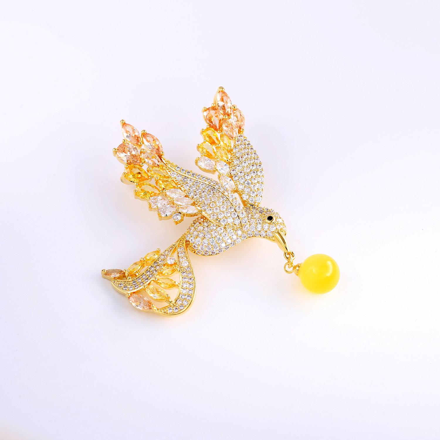 Nuovo olio di pollo naturale giallo russo cera d'api colibrì spilla di alta qualità femminile cera d'api perla corpetto foglia di albicocca design di nicchia