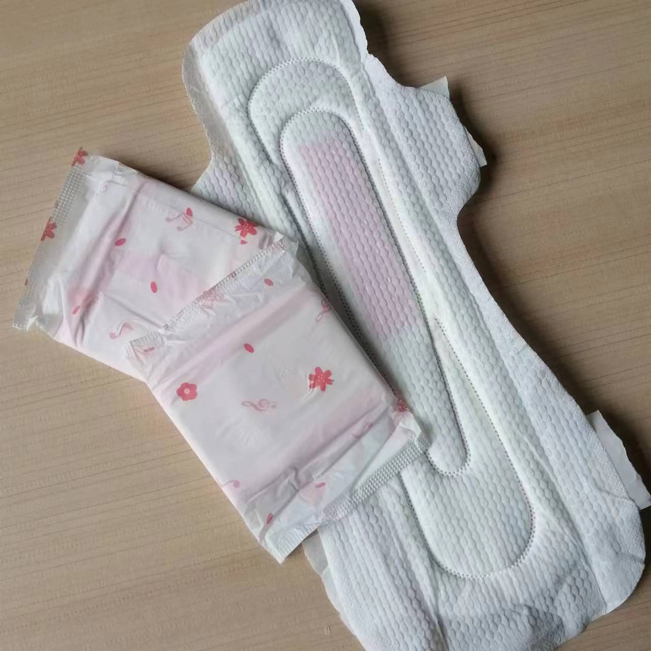 Meilleure qualité serviettes hygiéniques femmes serviettes menstruelles féminines ailes Style période serviettes hygiéniques serviettes hygiéniques super douces