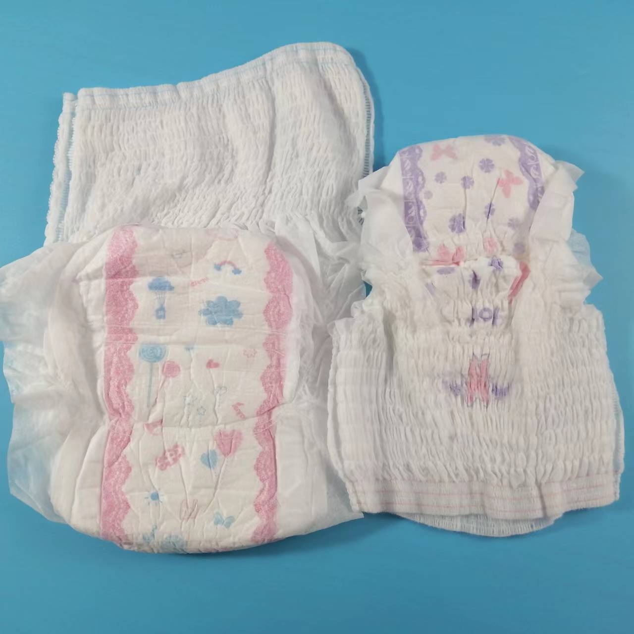 Precio barato, desechable, transpirable y saludable, tela no tejida caliente, tipo panty de servilleta sanitaria de alta calidad, fabricado en China