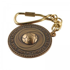 Привезак за кључеве од легуре никла и цинка у облику капице