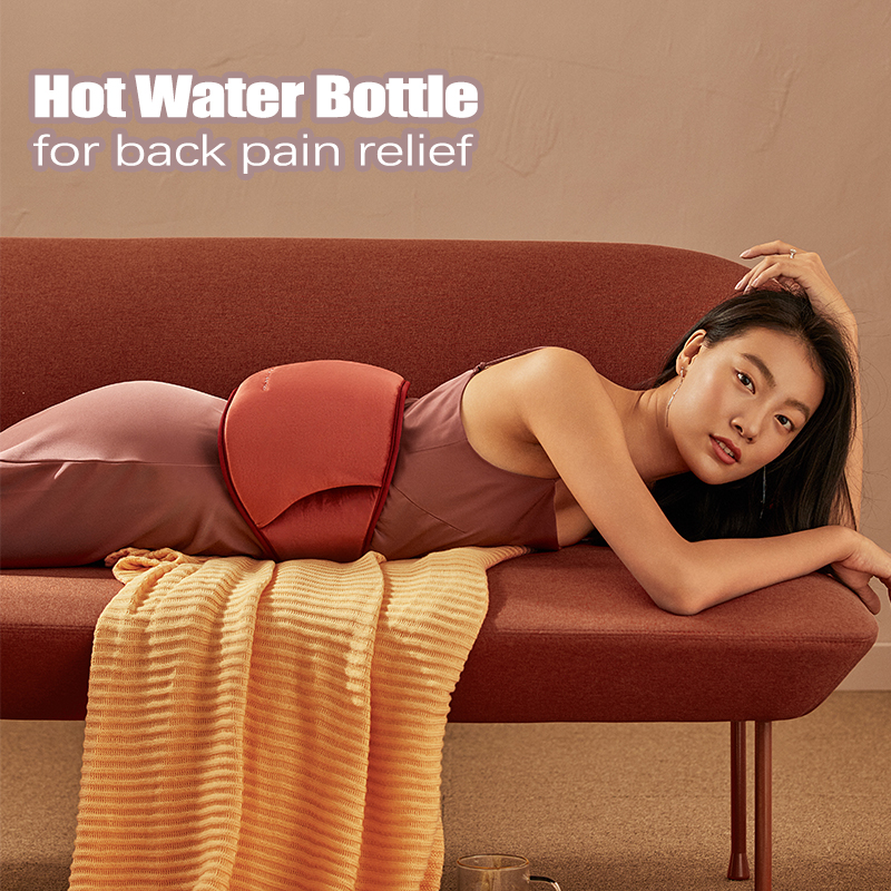 Како електричното шише со топла вода ја ублажува болката во грбот?