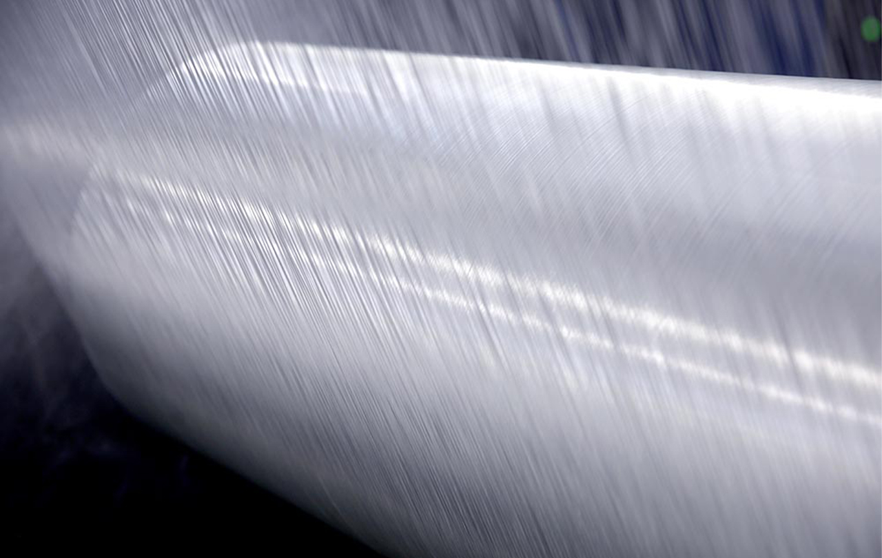 What are the commonly used glass fiber forms in the pultrusion process?