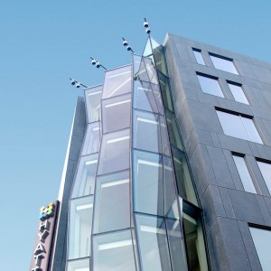 vier verdiepingen kantoorgebouw glazen vliesgevel kosten