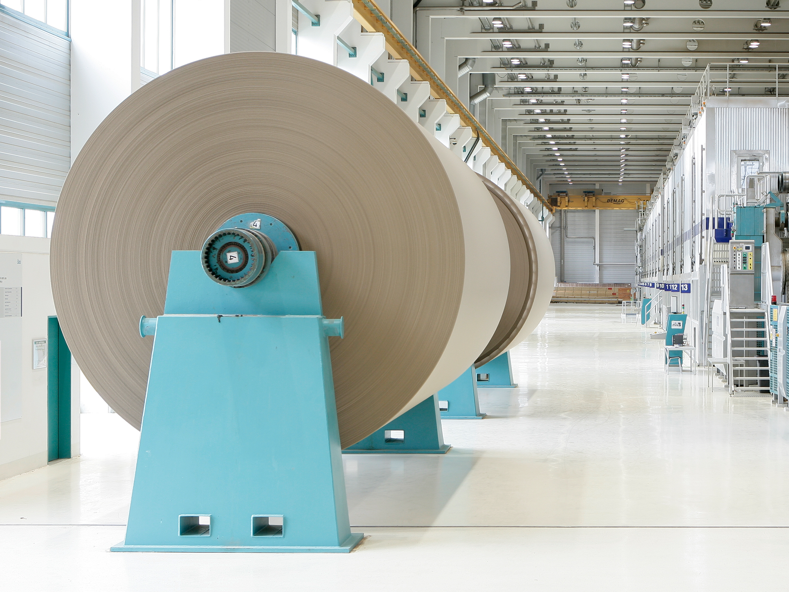 two-paper-reels-in-a-paper-mill-from-the-side
